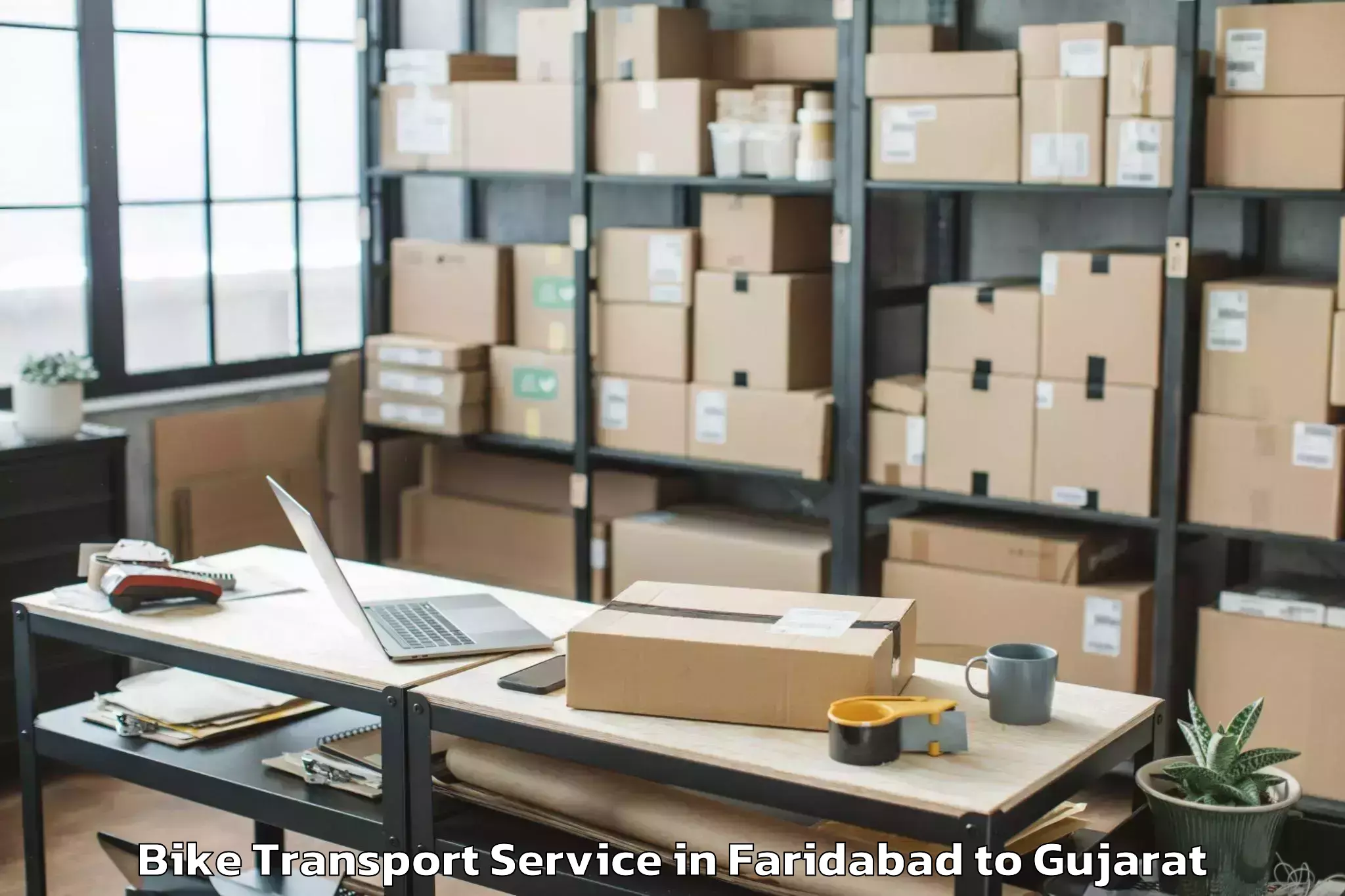 Book Faridabad to Dhuwaran Bike Transport